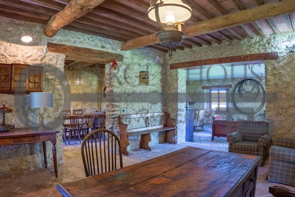 Panoramic Tuscan farmhouse near Bibbona with olive groves and country views — gallery photo 11