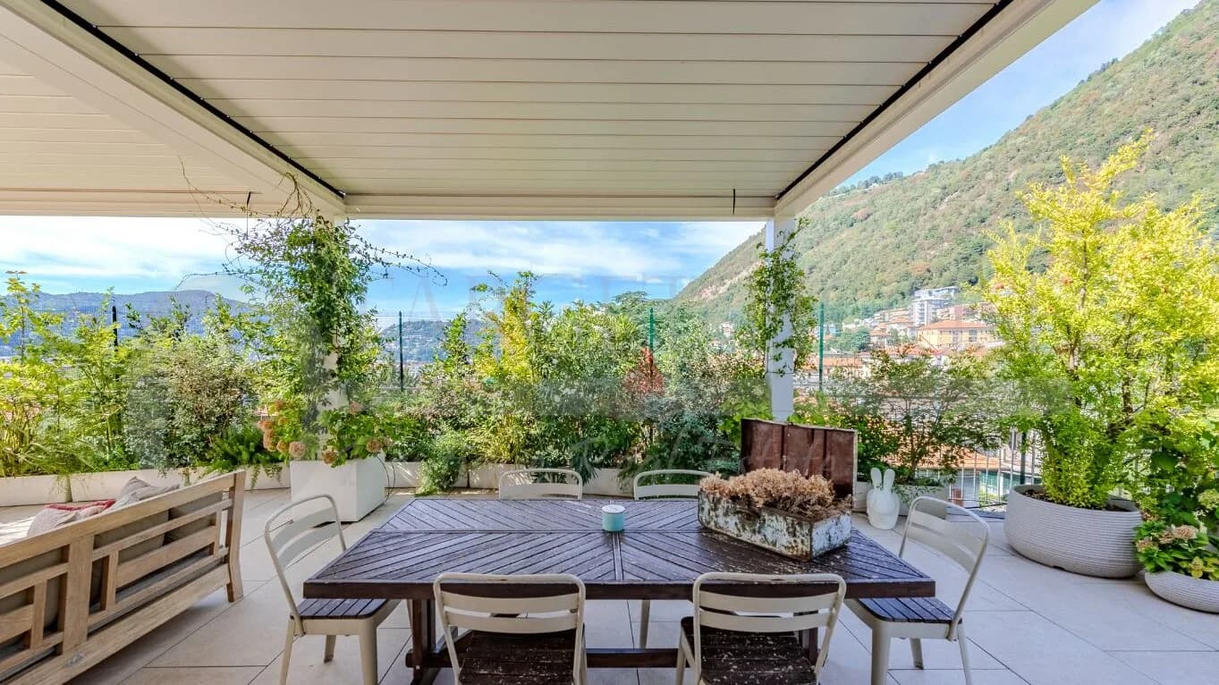 Panoramic terrace of a luxury single-level penthouse in Como