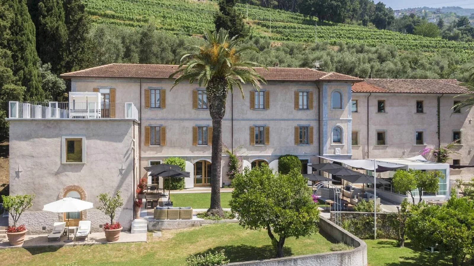 Historic Villa Alberico in Montignoso, Versilia, surrounded by Tuscan vineyards and gardens